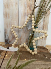 Load image into Gallery viewer, Perlen Stern in Beige oder Schwarz als Deko/Wohnaccessoires
