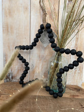 Load image into Gallery viewer, Perlen Stern in Beige oder Schwarz als Deko/Wohnaccessoires
